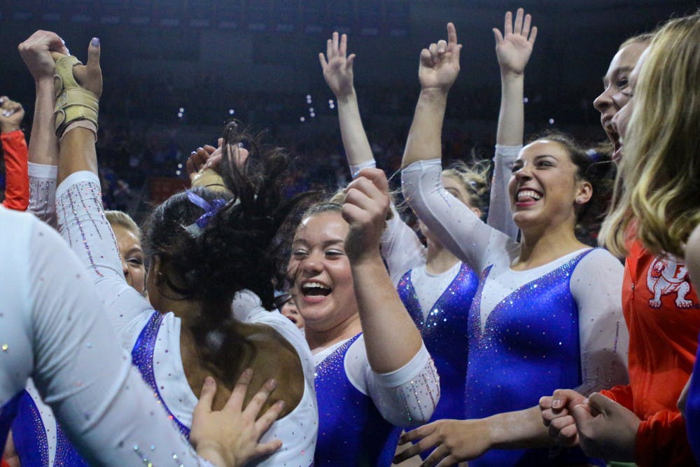 <p>Florida's gymnastics team finished second at the NCAA Championships on Friday night in St. Louis, securing a spot in Saturday's Super Six team final.</p>