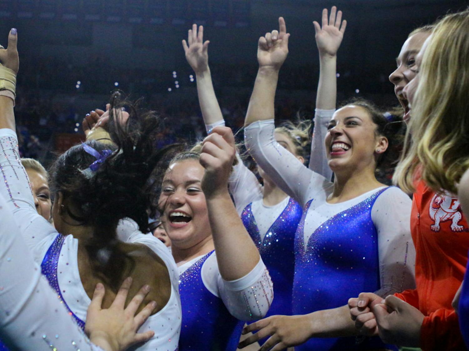 Florida's gymnastics team finished second at the NCAA Championships on Friday night in St. Louis, securing a spot in Saturday's Super Six team final.