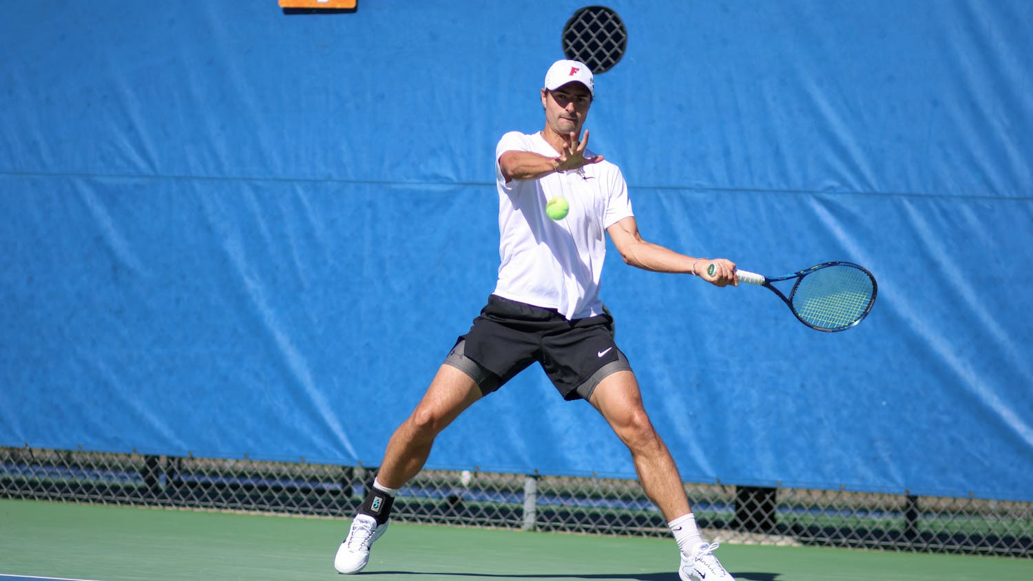 Florida graduate student Axel Nefve hits the ball in the Gators' 5-2 loss to the No. 8 Texas Longhorns Sunday, Jan. 15, 2023.