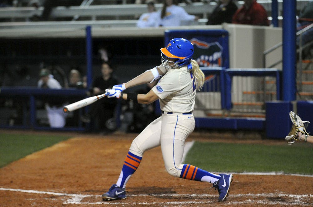 Kayli Kvistad follows through on a swing during Florida's doubleheader sweep against Jacksonville on Feb. 17, 2016, at Katie Seashole Pressly Stadium.