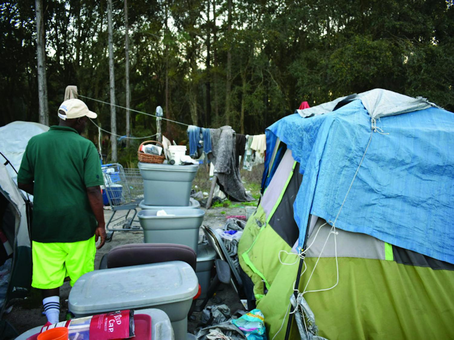 Rupert Heard, 55, gives a tour of his camp fit for three. As camp leader, he manages his group’s finances and stocks up on daily supplies.
