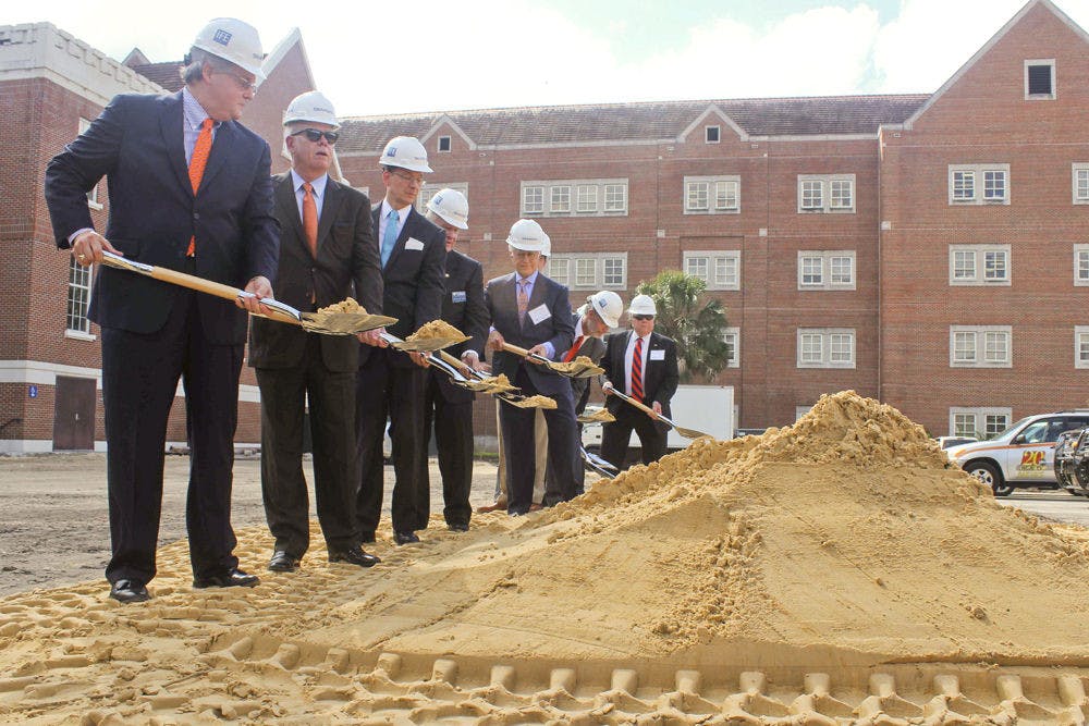 <p class="p1">UF President Bernie Machen, second from left, participates in the Chemistry/Chemical Biology Building groundbreaking ceremony Friday.</p>