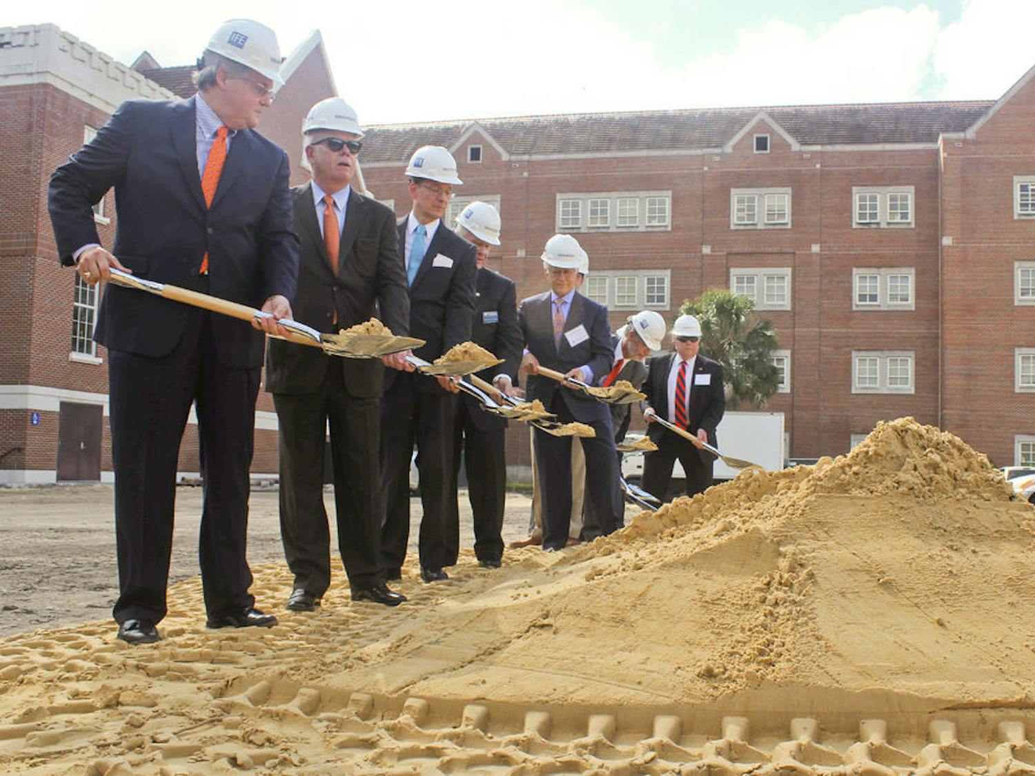 UF President Bernie Machen, second from left, participates in the Chemistry/Chemical Biology Building groundbreaking ceremony Friday.