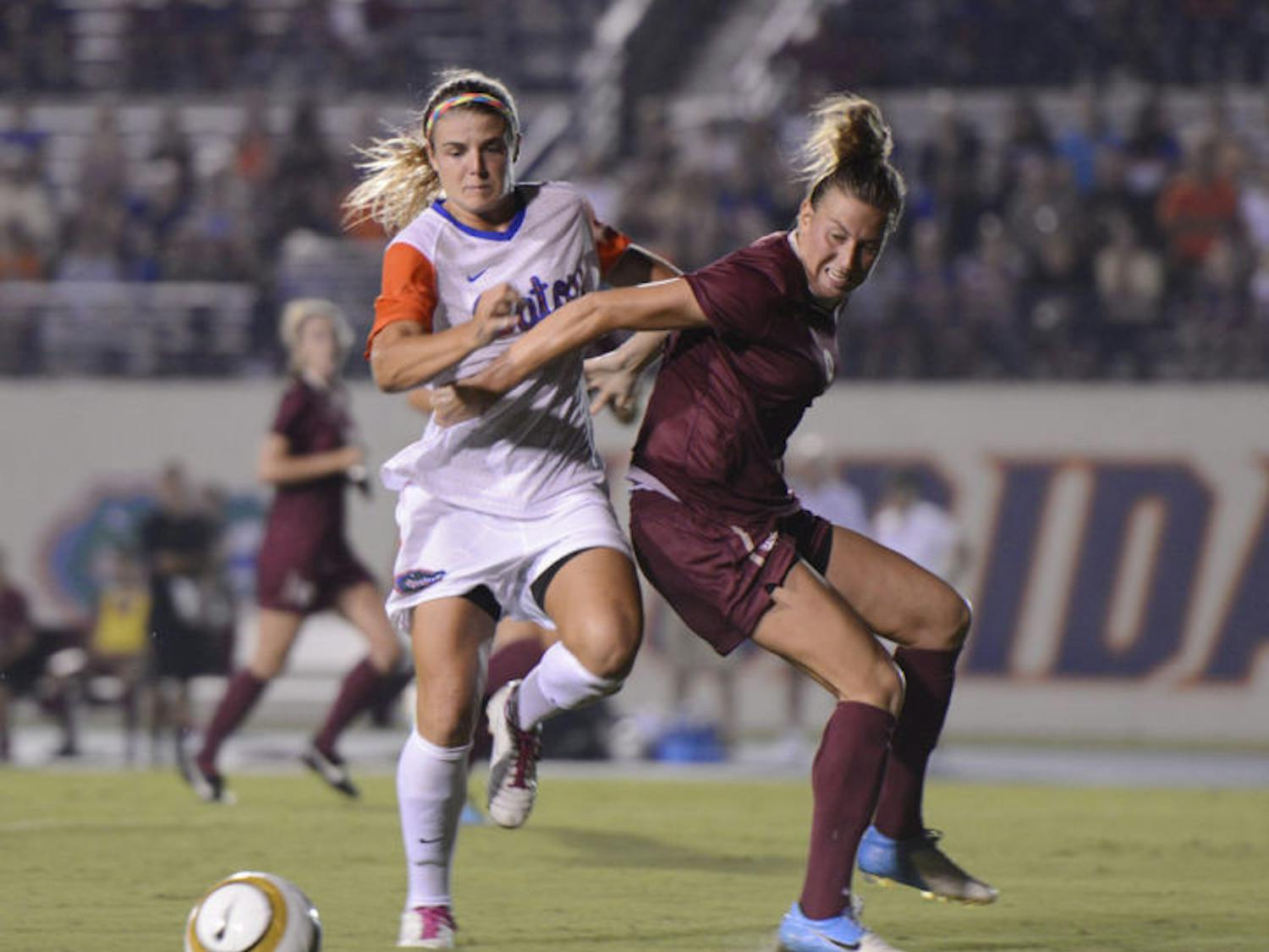 Savannah Jordan (left) pushes past an opponent during Florida’s 3-0 loss against Florida State on Aug. 30 at James G. Pressly Stadium.