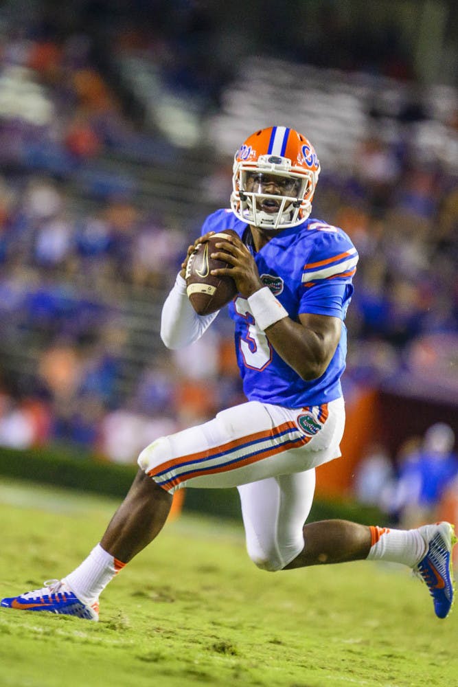 Treon Harris looks downfield for a receiver during Florida's 42-13 loss to Missouri on Oct. 18 at Ben Hill Griffin Stadium.