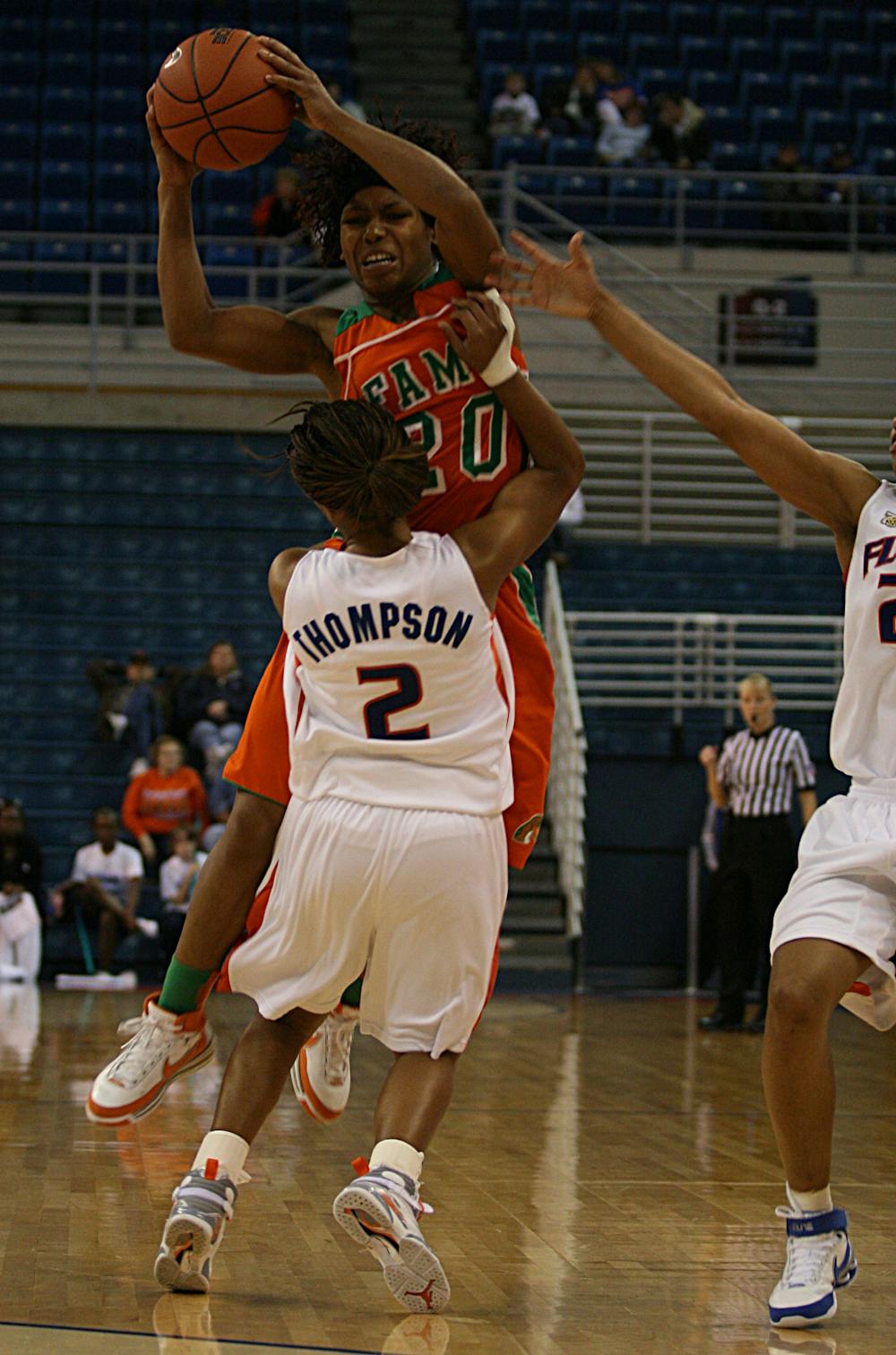 Lonnika Thompson blocks a shot during the Gators' 71-51 win against Florida A&M University on Jan. 2 at the O'Connell Center. (Jeremiah Stanley / Alligator)