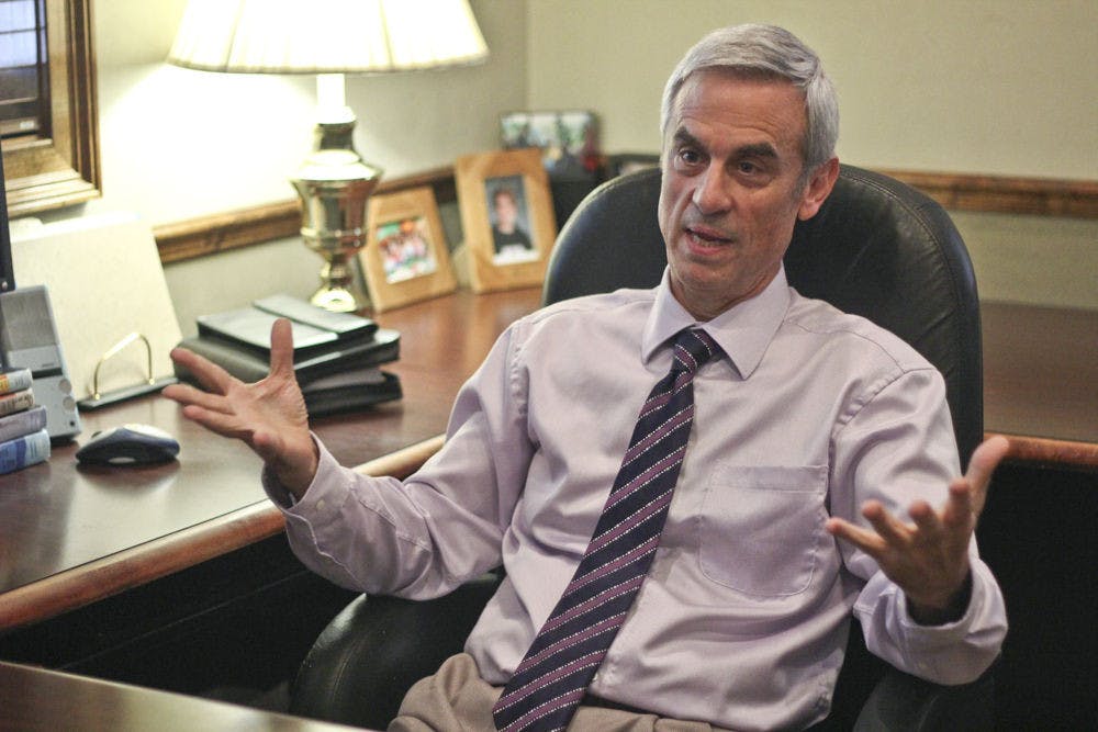 Steve Kalishman, president of the Sister City Program, talks about how the program can help solve the Israeli-Palestinian conflict in his office in Haile Village on Sept. 15, 2015. "We can be a bridge and we can bring about change through relationships--real, lasting relationships," Kalishman said.