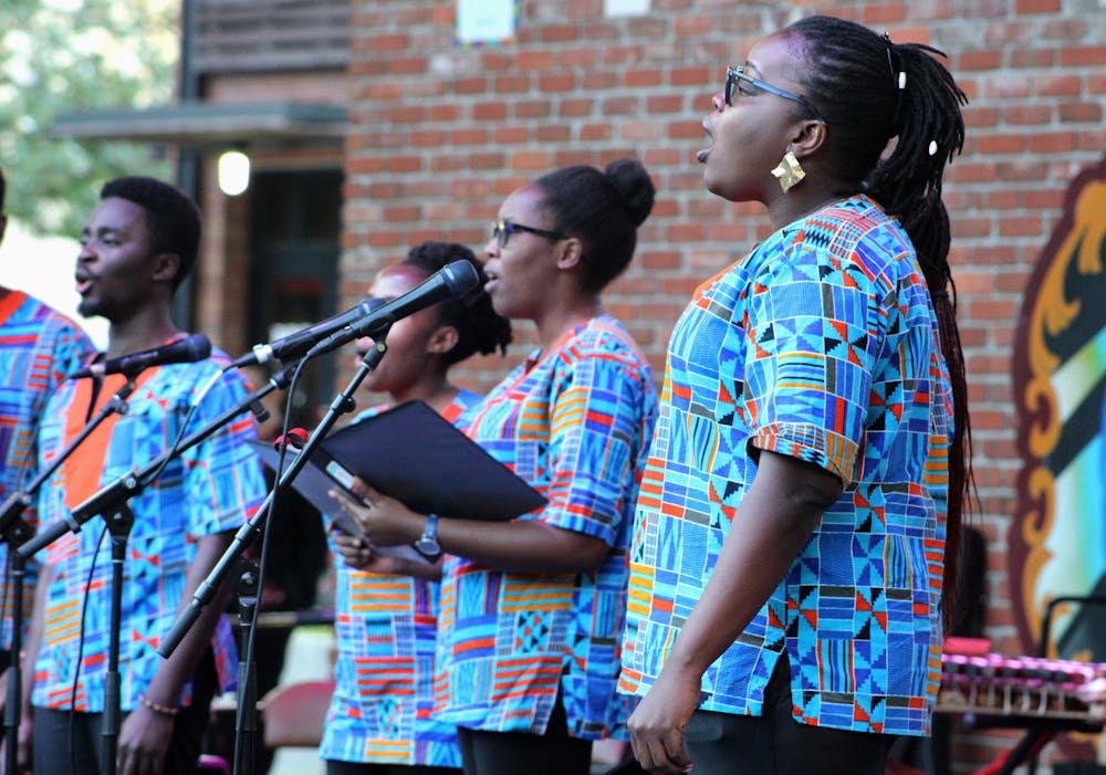 ​​The UF Pazeni Sauti Africa Choir performs at Afro Roots Fest at Bo Diddley Plaza on Friday, April 8. 