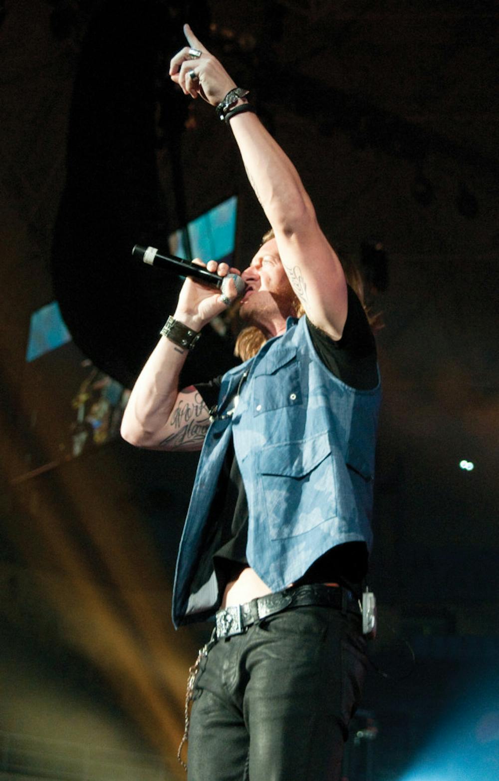 <p>Tyler Hubbard, of Florida Georgia Line, performs at the O’Connell Center in 2013 as part of a Student Government Productions show.</p>