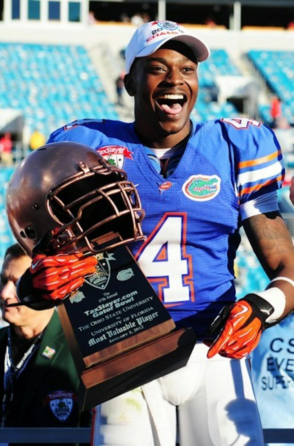 <p>Junior wide receiver Andre Debose smiles as he accepts the trophy for Most Valuable Player at the Gator Bowl on Jan. 2.&nbsp;in Jacksonville. Debose hasn't replicated the success he had in 2011.&nbsp;</p>