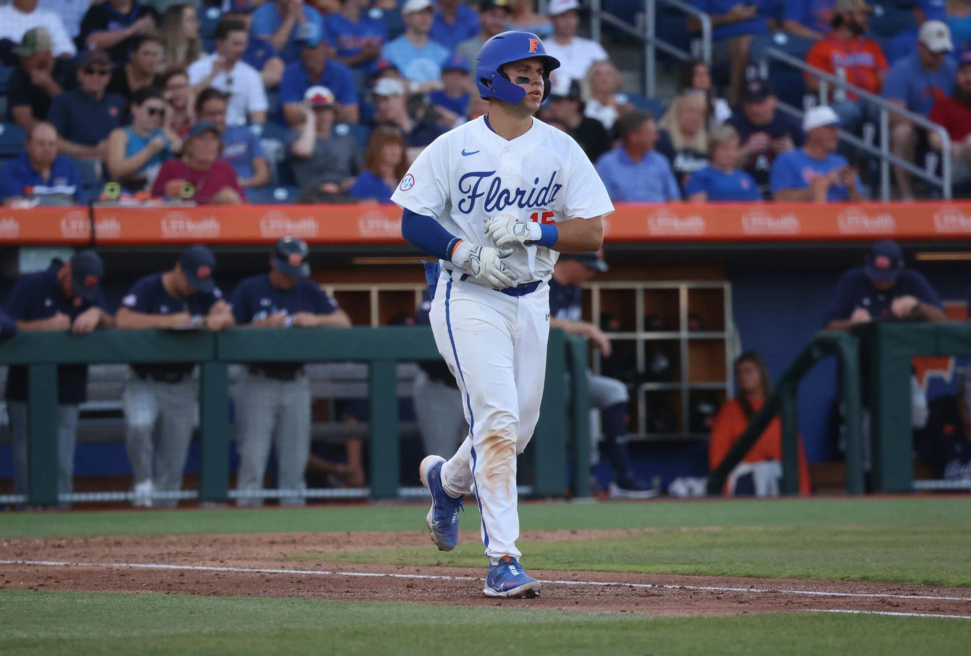 Florida catcher BT Riopelle jogs to first base during the Gators' 10-1 loss to the Auburn Tigers Friday, March 31, 2023.