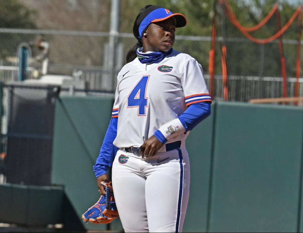 <p>Charla Echols at third base against Charlotte on Feb. 20. The Michigan State transfer roped her first hit in four  games over the right-center field wall.</p>