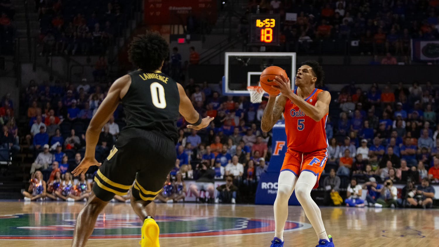 Gators men's basketball junior guard Will Richard begins to shoot the ball in the team's 77-64 win over the Vanderbilt Commodores on Saturday, February 24, 2024. 