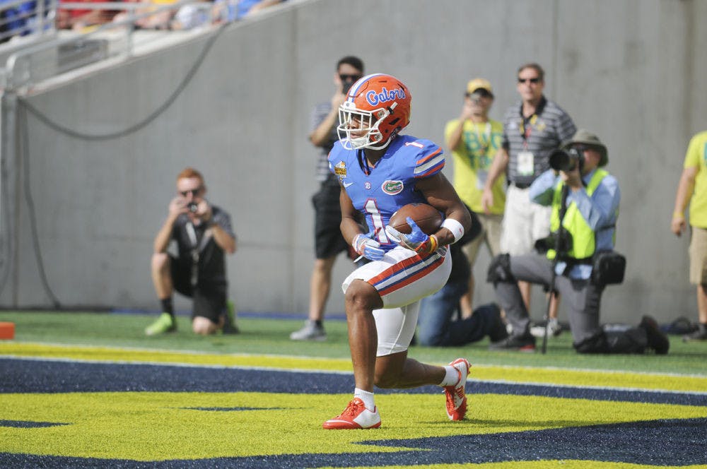 UF cornerback Vernon Hargreaves kneels in the end zone for a touchback during Florida's 41-7 loss to Michigan in the Citrus Bowl on Jan. 1, 2016, in Orlando.