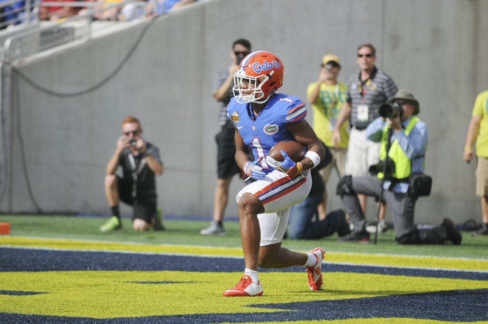 <p>UF cornerback Vernon Hargreaves kneels in the end zone for a touchback during Florida's 41-7 loss to Michigan in the Citrus Bowl on Jan. 1, 2016, in Orlando.</p>