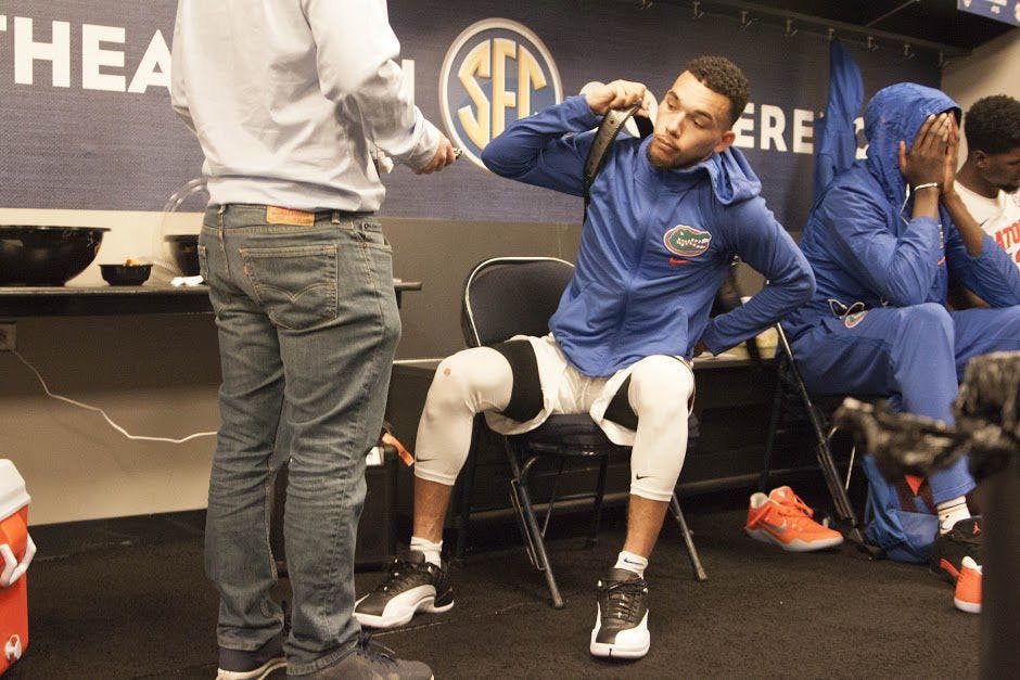 UF guard Chris Chiozza answers questions following Florida's 72-62 loss to Vanderbilt in the Southeastern Conference Tournament on March 10, 2017, in Nashville, Tennessee.