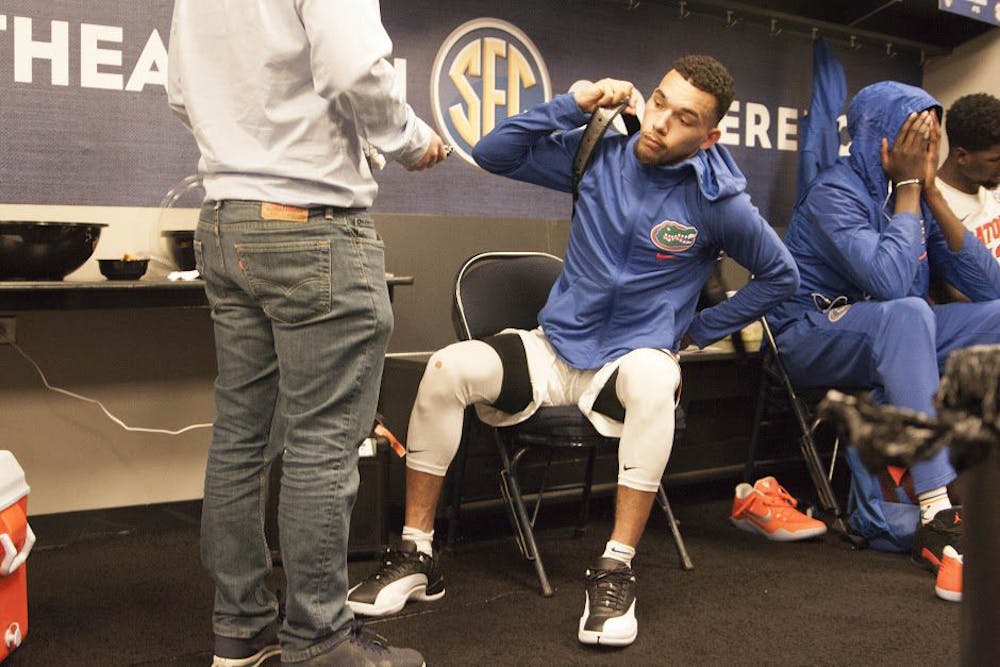 <p>UF guard Chris Chiozza answers questions following Florida's 72-62 loss to Vanderbilt in the Southeastern Conference Tournament on March 10, 2017, in Nashville, Tennessee.</p>