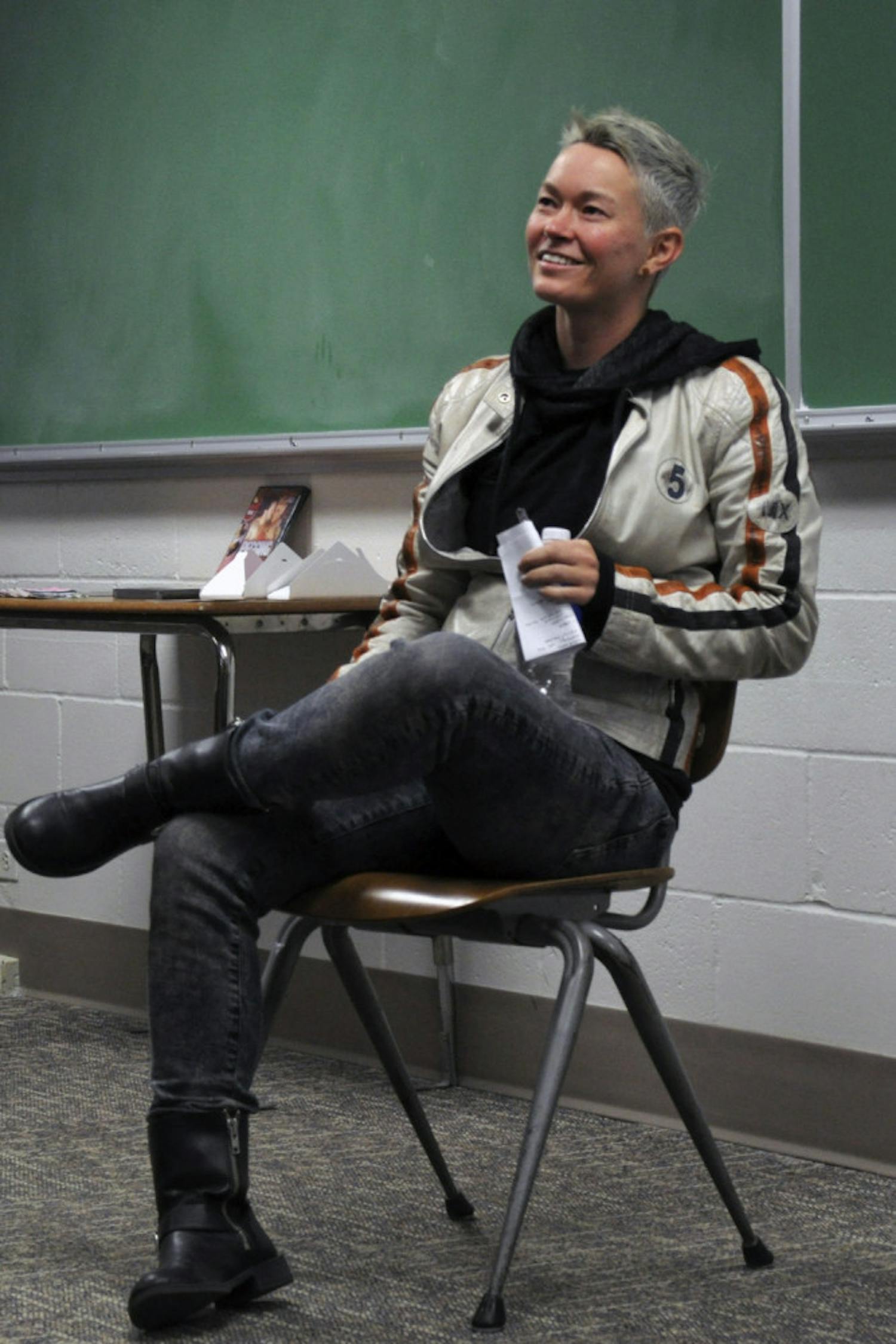 Jiz Lee, a 34-year-old gender queer adult film star, speaks to a small crowd on Wednesday as a part of Pride Student Union's Sexxx Week. Lee discussed their experience in porn, expressing gender and having sexual agency.