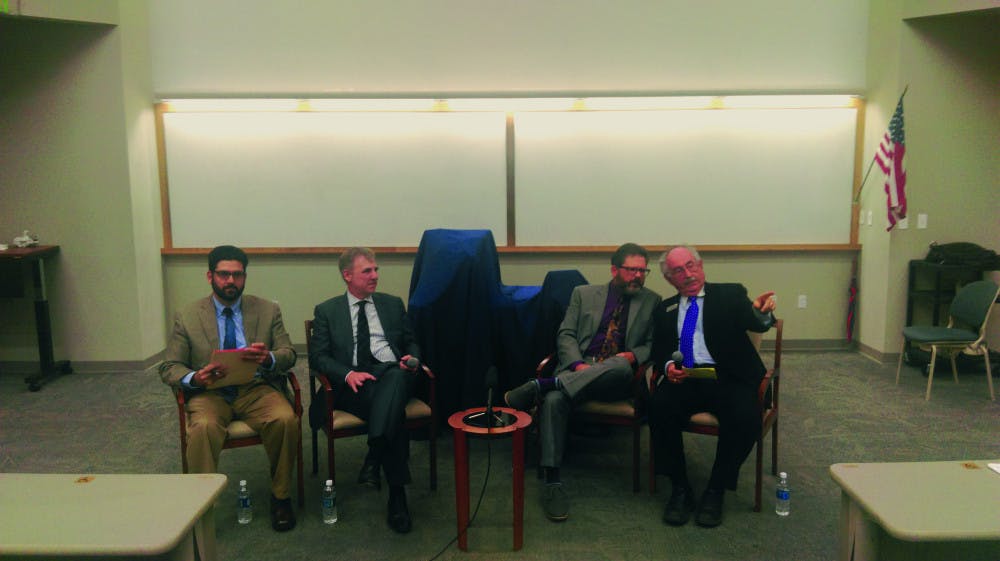 From left: The Gainesville Sun’s opinions editor, Nathan Crabbe; the Utility Advisory Board’s chair, Darin Cook; Gainesville Regional Utitlies’ general manager, Ed Bielarski; and at-large Gainesville City Commissioner Harvey Budd.