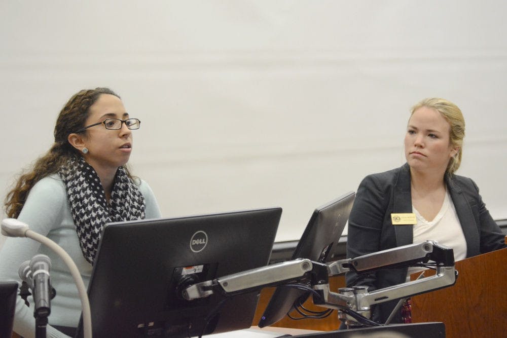 <p>Student Body President Joselin Padron-Rasines addresses the Senate on Tuesday night as Senate President Susan Webster looks on. Padron-Rasines thanked the senators for unanimously passing the CITF committee appointments.</p>