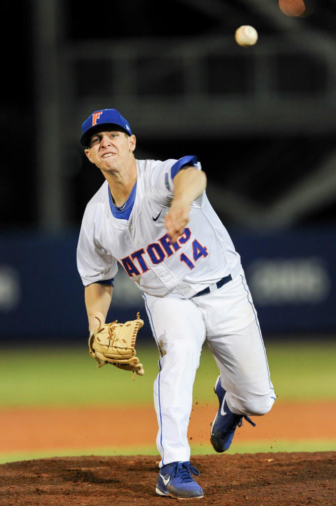 Bobby Poyner pitches during Florida’s 4-0 win against Maryland on Feb. 14 at McKethan Stadium.