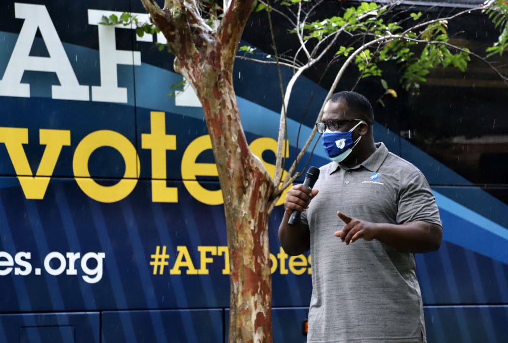 A picture of Federick Ingram giving a speech on voting