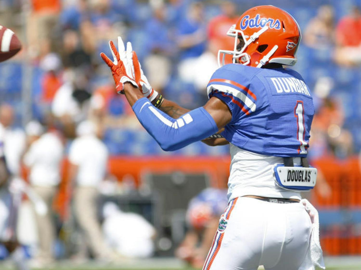 Quinton Dunbar reaches for a pass during warm-ups prior to Florida’s game against Kentucky on Sept. 22 in Ben Hill Griffin Stadium. The Gators defeated the Wildcats 38-0.
