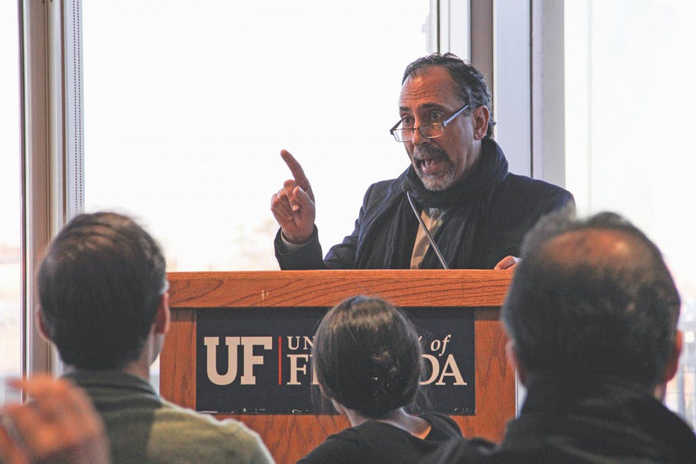 Leonardo A. Villalón, the dean of the UF international center, addresses those who are concerned about the president’s new travel ban in the Arredondo Café at the Reitz Union on Monday afternoon. “Your lives are very much affected by this,” Villalón told the crowd of about 100 in attendance. 