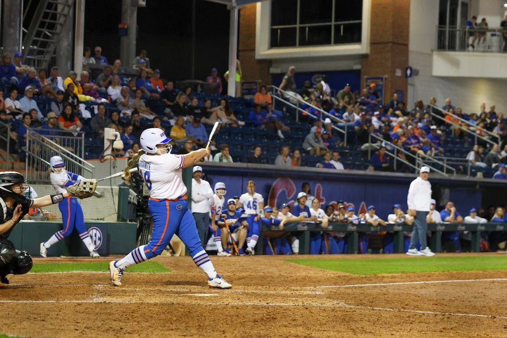 Florida pitcher Olivia Gigante swings her bat in the Gators' 11-0 win against the Jacksonville Dolphins Wednesday, Feb. 15, 2023.