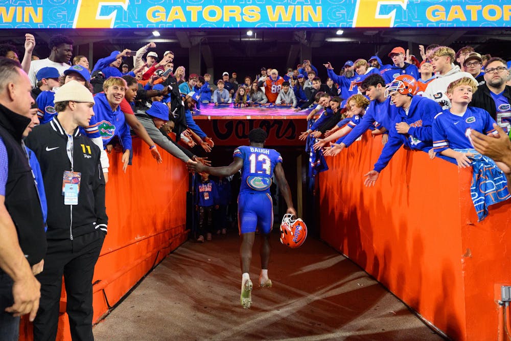 Florida running back Jadan Baugh (13) walks to the locker room after an NCAA college football game against Florida State, Saturday, Nov. 29, 2025, at Ben Hill Griffin Stadium in Gainesville, Fla.