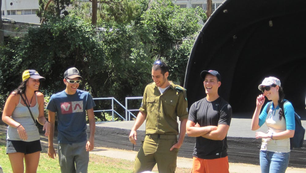 <p>UF students on a Hillel Birthright trip meet the Israeli soldier
who will accompany them during their trip.</p>