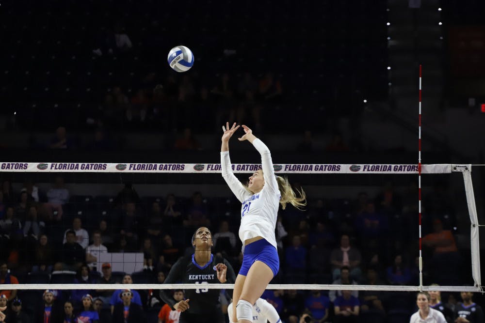 Now-junior Marlie Monserez sets for the Gators at last year's home match versus Kentucky. The setter and her teammates will be back in the O'Connell Center Friday for the first home match of the 2020 season.