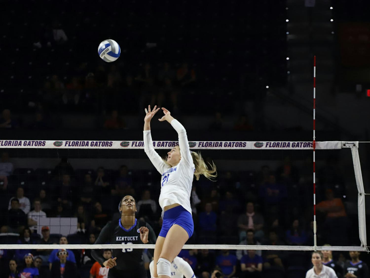 Now-junior Marlie Monserez sets for the Gators at last year's home match versus Kentucky. The setter and her teammates will be back in the O'Connell Center Friday for the first home match of the 2020 season.