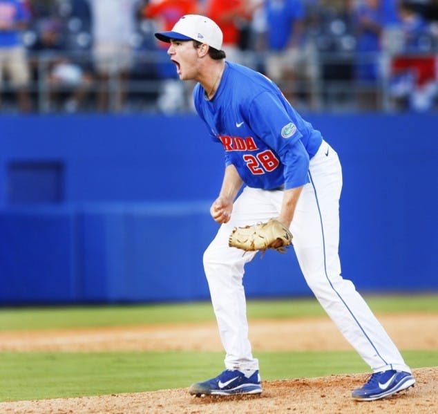 Keenan Kish celebrates after striking out Chris Diaz of North Carolina State to win the Super Regional game Sunday. Kish is scheduled to start against North Florida on Tuesday.