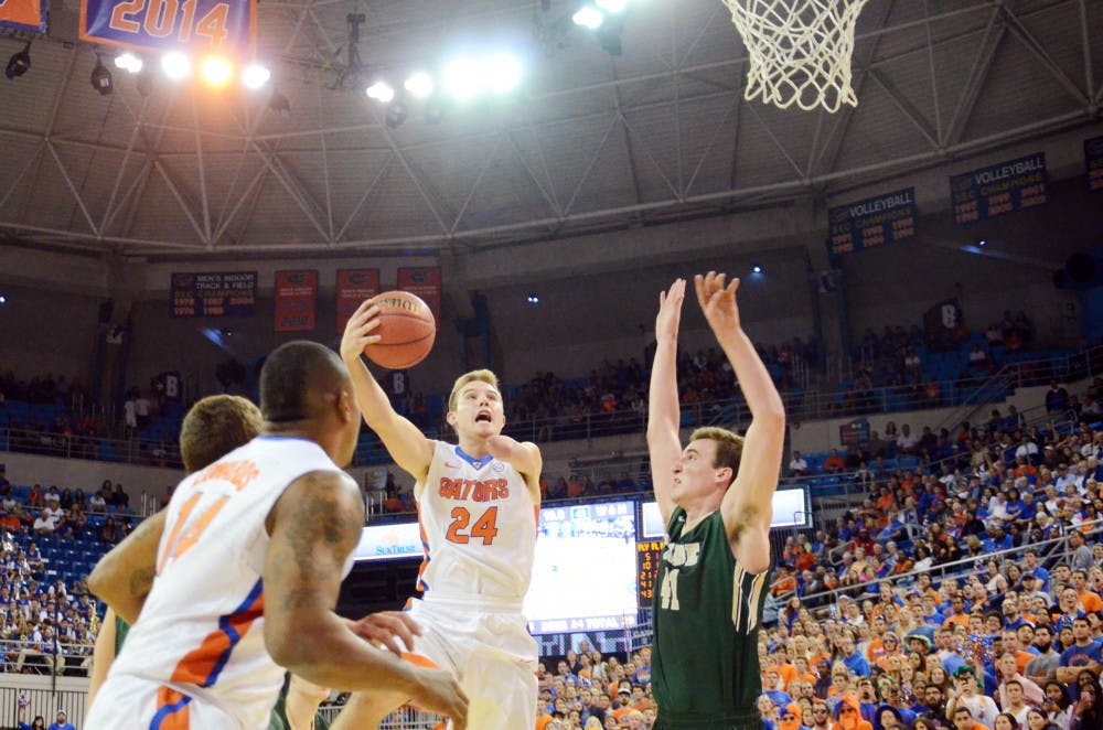 Freshman Zach Hodskins goes up for a layup during Florida's 68-45 win against William &amp; Mary on Friday in the O'Connell Center.