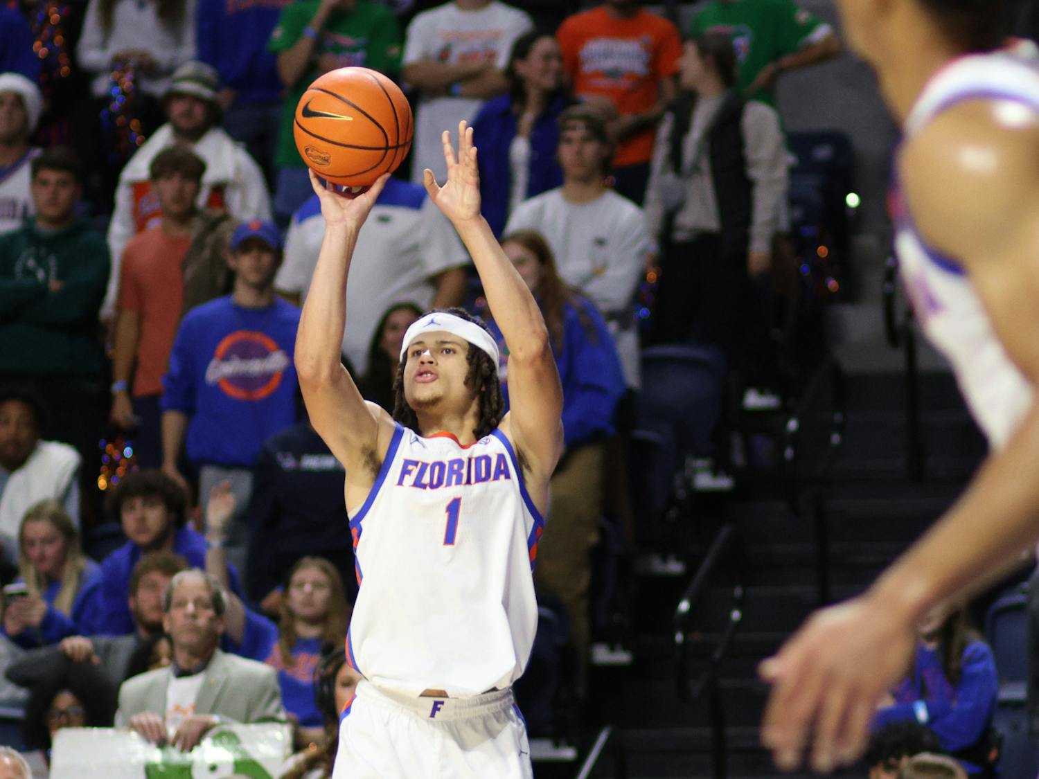 Florida junior guard Walter Clayton Jr. shoots the ball in the Gators' 77-57 win against the Merrimack Warriors on Tuesday, Dec. 5, 2023. 