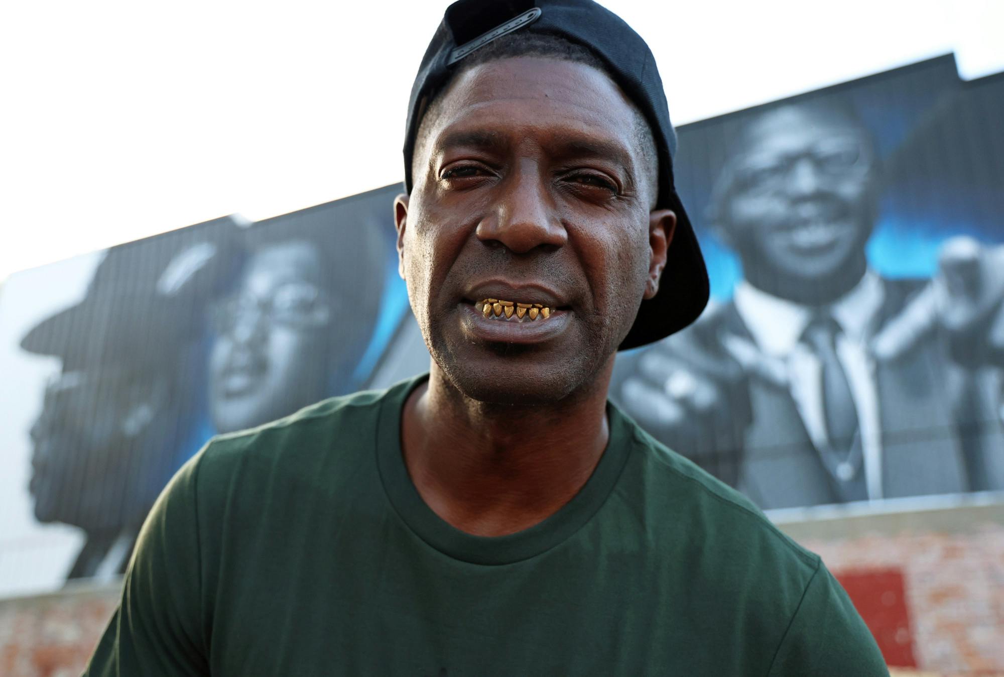 Gerald Jones, known professionally as Fie Scooby, poses in front of the Bo Diddley mural on Southwest First Avenue on Friday, July 18, 2025.
