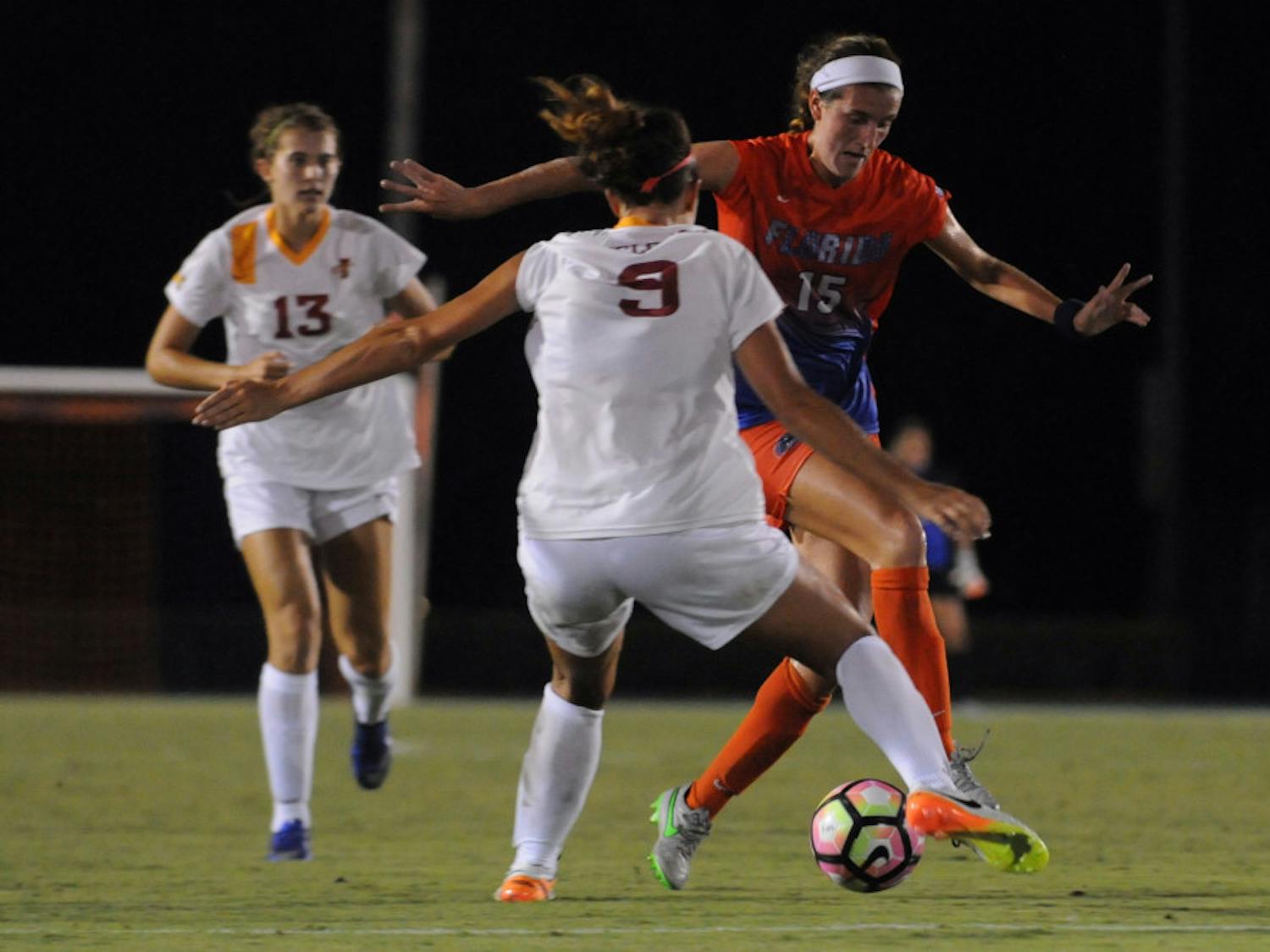 UF midfielder Sarah Troccoli dribbles past an Iowa State defender during Florida's 5-2 win against Iowa State on Aug. 19, 2016, at James G. Pressly Stadium.