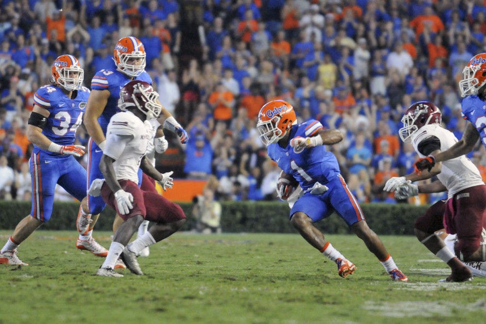 UF cornerback Vernon Hargreaves III returns an interception during Florida’s 61-13 win against New Mexico State on Saturday at Ben Hill Griffin Stadium.