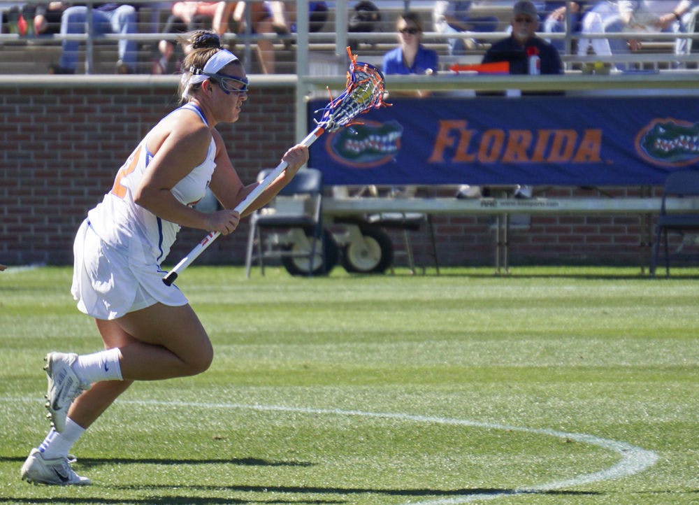 Senior Taylor Bresnahan scored a hat trick for Florida in a dominant, 14-7 victory over Lousiville.