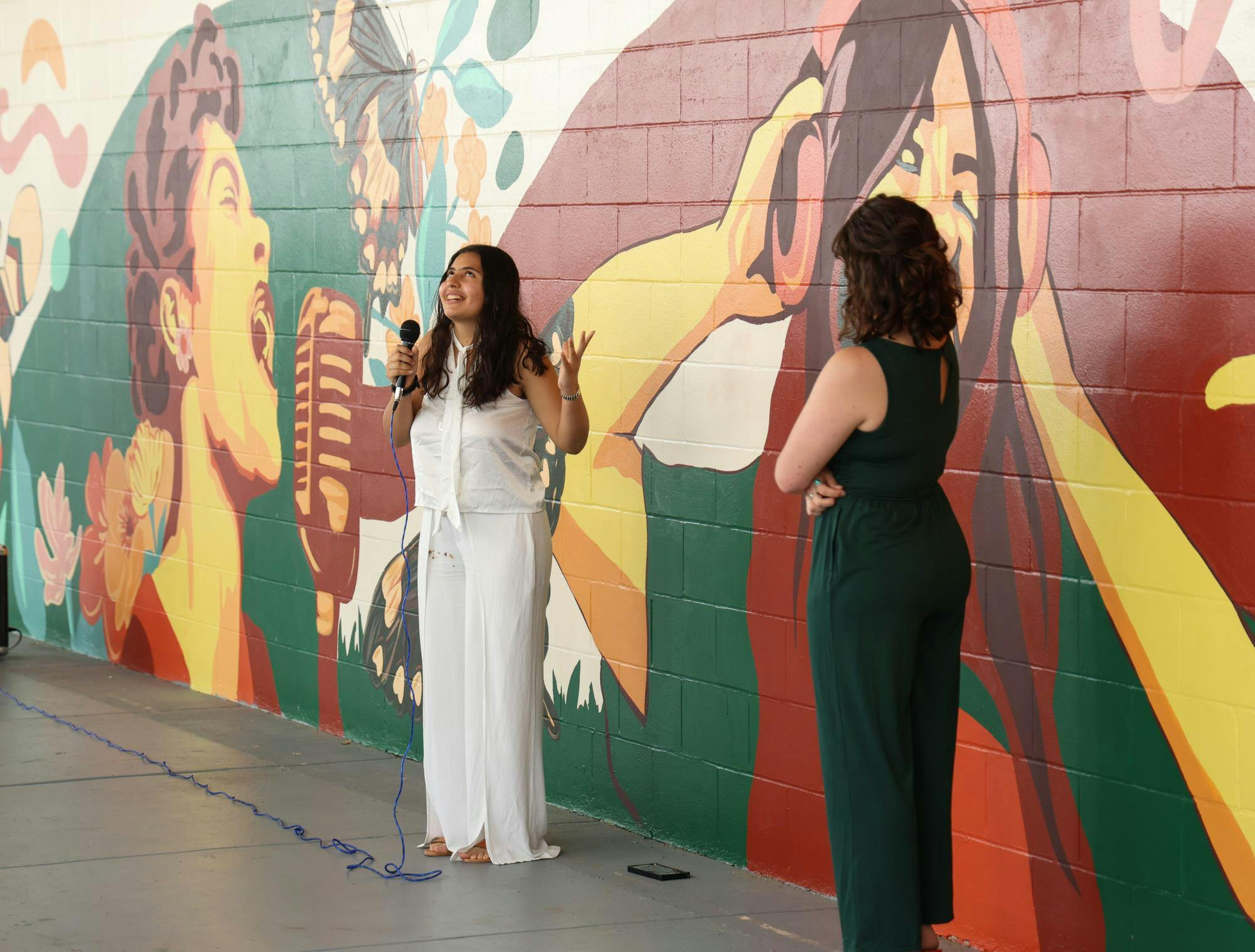 Isabela Perez Thomas, a junior at Eastside High School, talks about her experience helping with the mural at the unveiling in Gainesville, Fla. on Tuesday March 31, 2026.