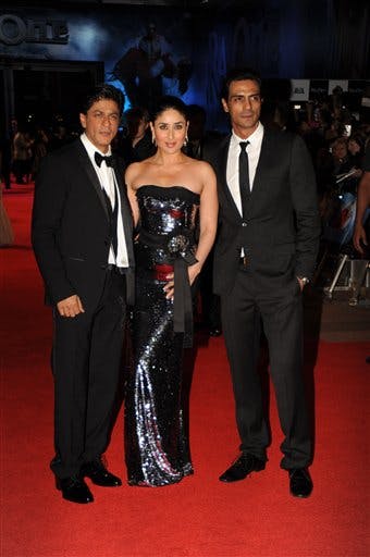 "Ra.One" stars Shahrukh Khan, Kareena Kapoor and Arjun Rampal pose at the film's premiere in London on Tuesday. Among other records, "Ra.One" became the first 3-D Bollywood film to be released in the U.K.