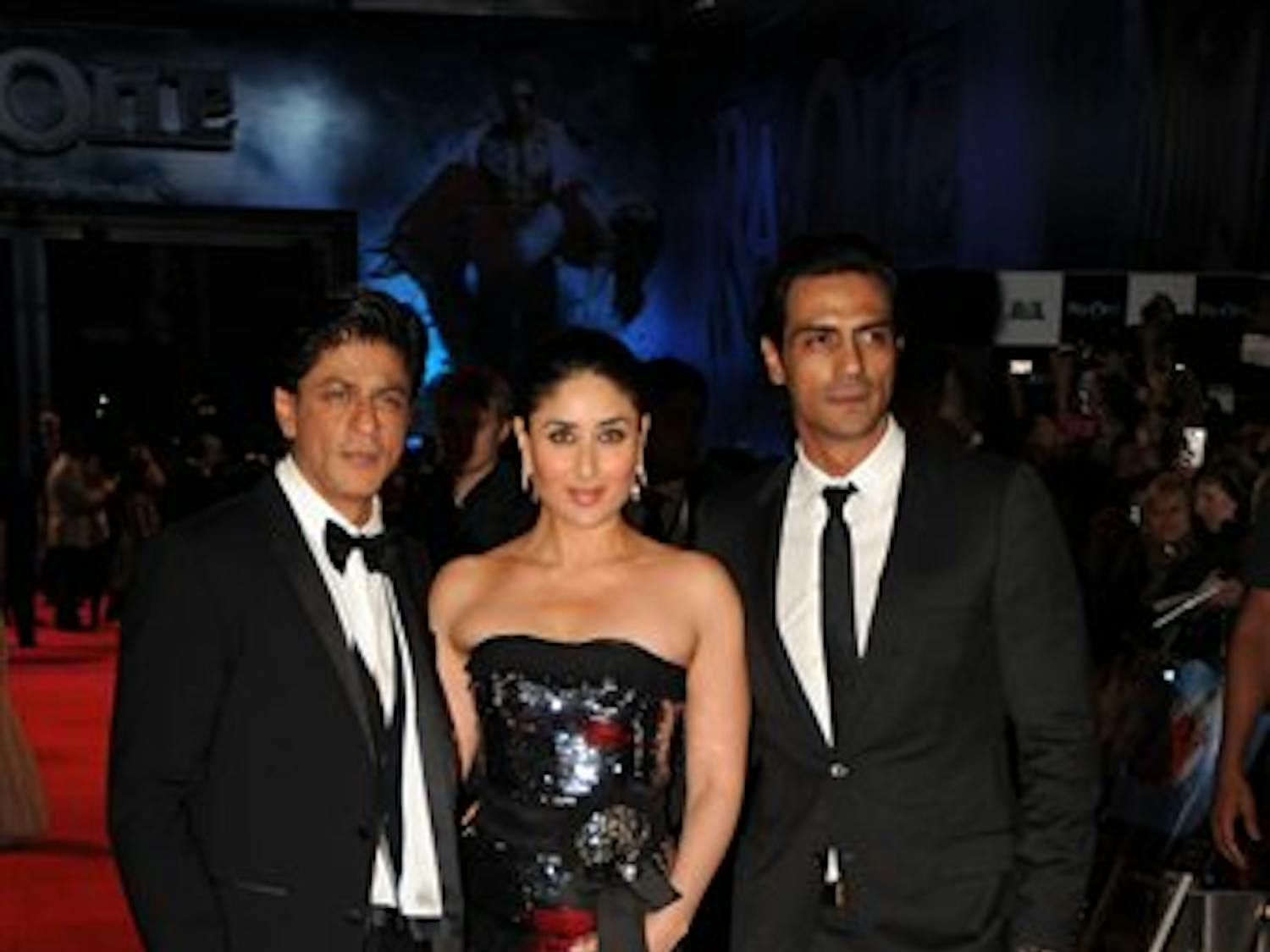 "Ra.One" stars Shahrukh Khan, Kareena Kapoor and Arjun Rampal pose at the film's premiere in London on Tuesday. Among other records, "Ra.One" became the first 3-D Bollywood film to be released in the U.K.