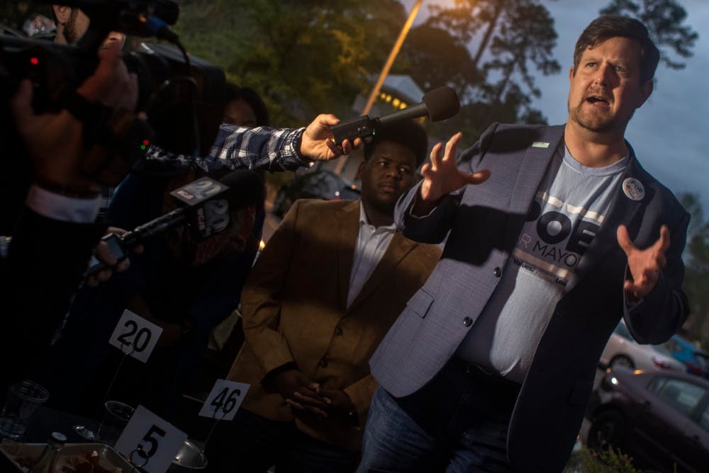 Lauren Poe speaks to a crowd of reporters and about 100 supporters March 20, 2019 at the Public and General restaurant after elections. Poe beat three opponents to win his second term as mayor of Gainesville. 