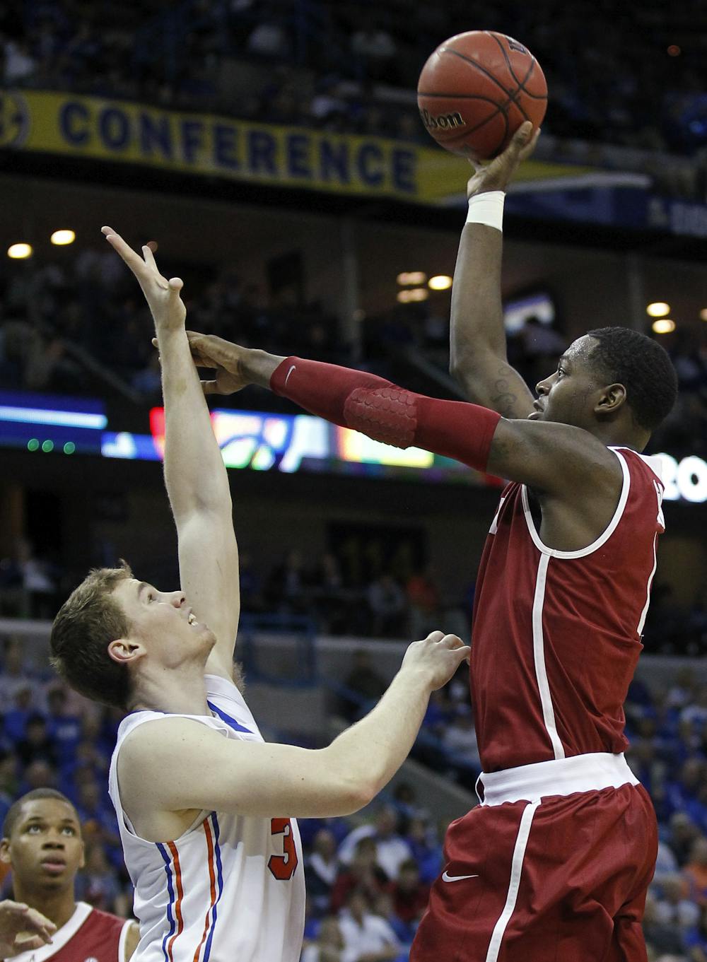 <p>Alabama forward JaMychal Green (1) shoots over Florida's Erik Murphy (33) during the first half of an NCAA college basketball game in the second round of the Southeastern Conference tournament at the New Orleans Arena in New Orleans, Friday, March 9, 2012.</p>