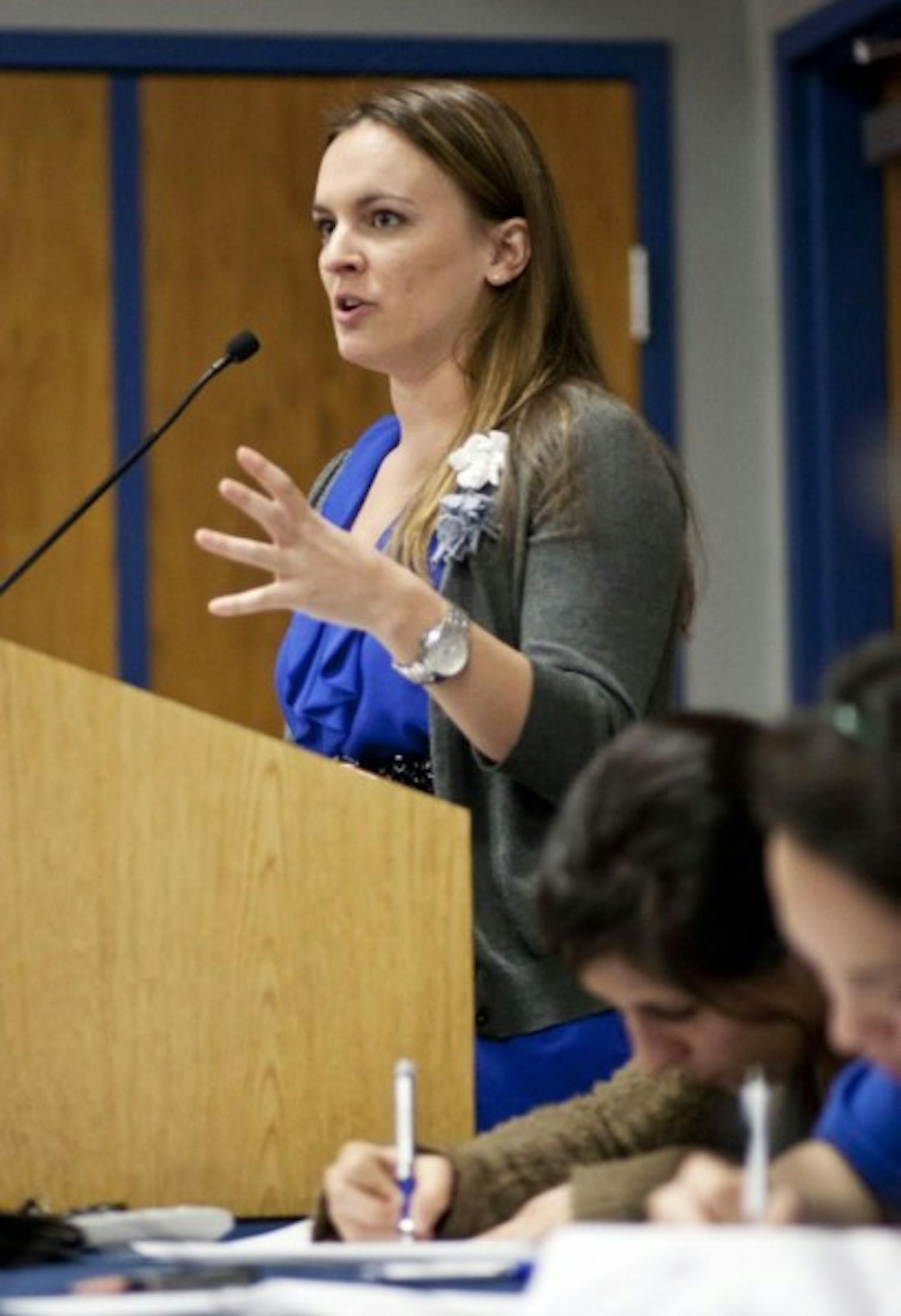 Supervisor of Elections Toni Megna, 21, presents her contingency plan at the Student Senate meeting Tuesday night.