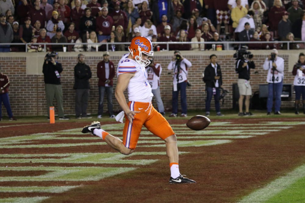 <p>Johnny Townsend punts during Florida's 31-13 loss to Florida State on Nov. 26, 2016, at Doak Campbell Stadium.</p>
