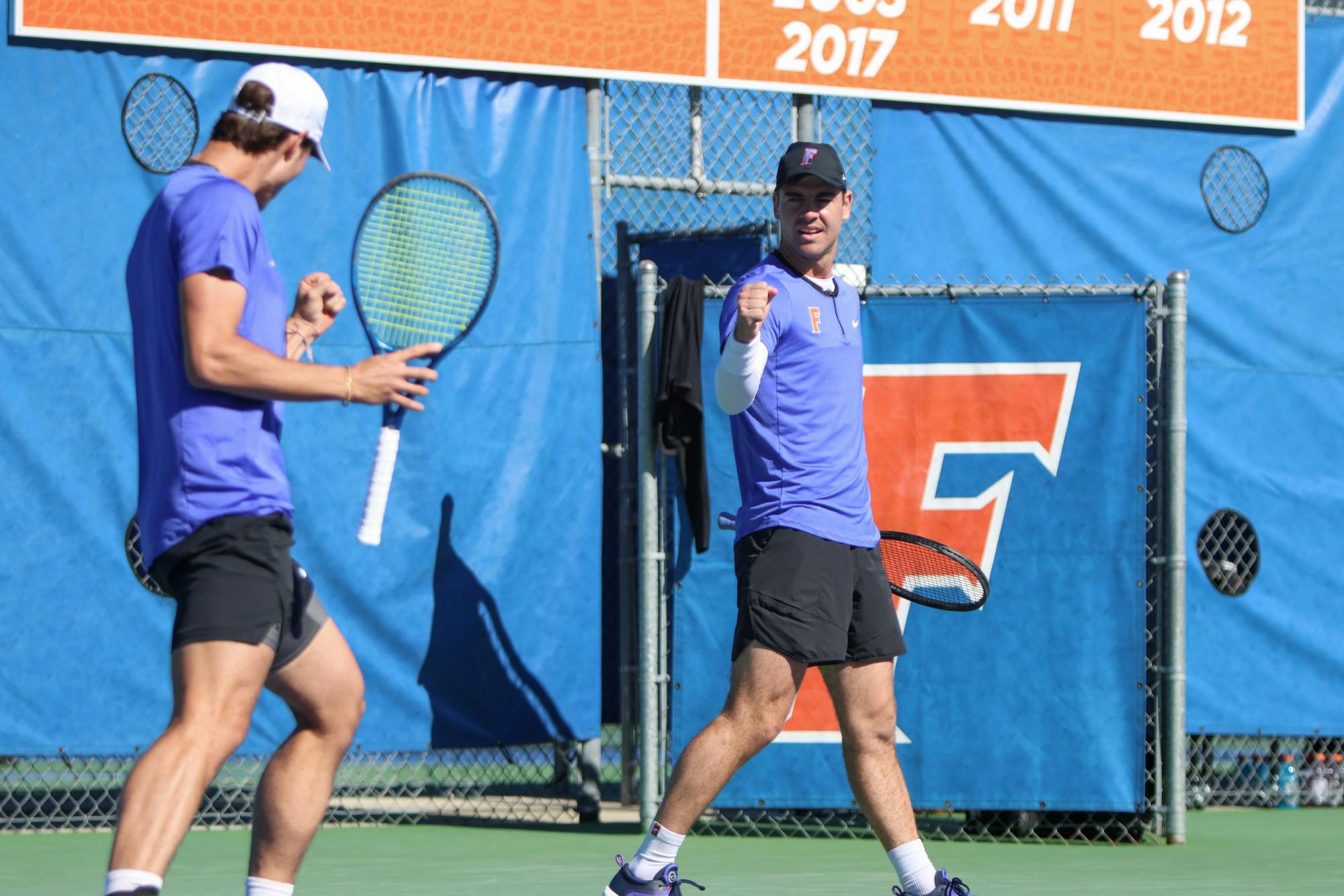 Gators Will Grant and Axel Nefve celebrate during Florida's loss to the Texas Longhorns Jan. 15, 2023.