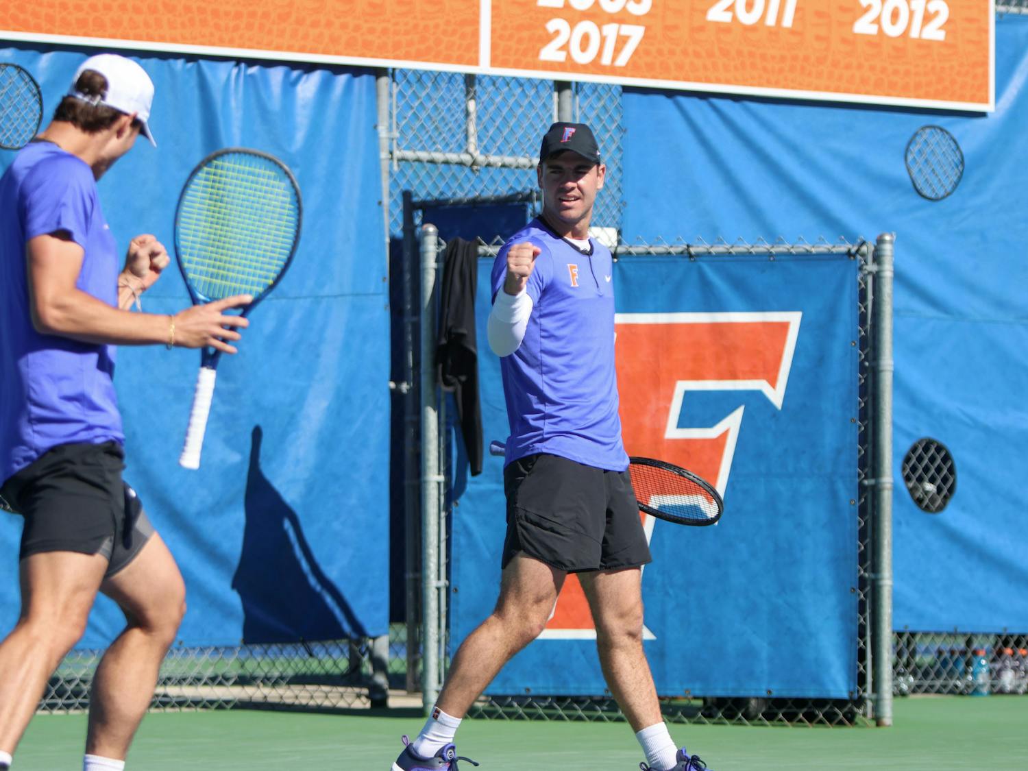 Gators Will Grant and Axel Nefve celebrate during Florida's loss to the Texas Longhorns Jan. 15, 2023.