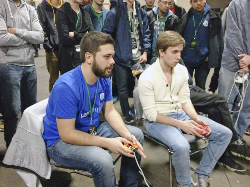 Juan “Hungrybox” Debiedma plays against Mustafa “Ice” Akcakaya, from Germany, at Apex 2015. Debiedma placed fifth out of about 1,000 entrants.